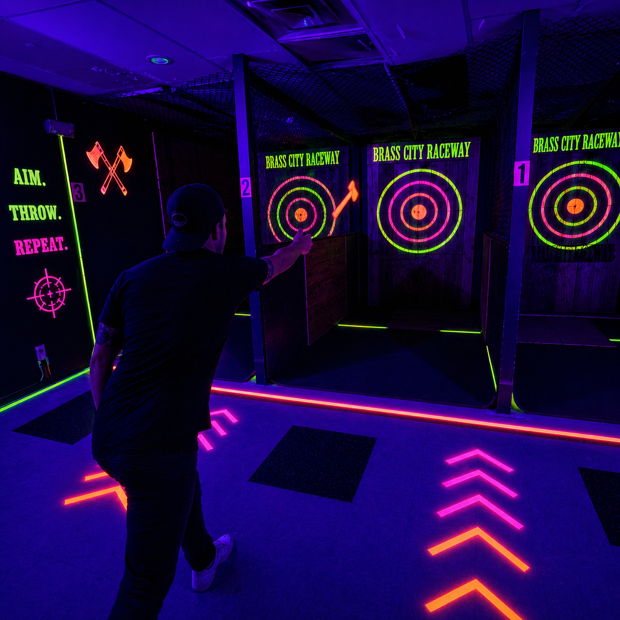 Glow Throws blacklight axe throwing at Brass City Raceway